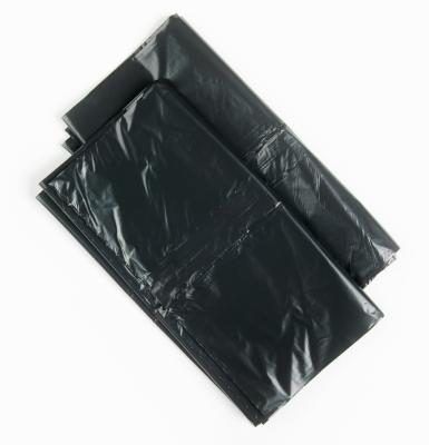 Des sacs poubelles noirs pour couvrir les graines avec.